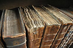 "Old book bindings.jpg", uploaded by User:Brighterorange
